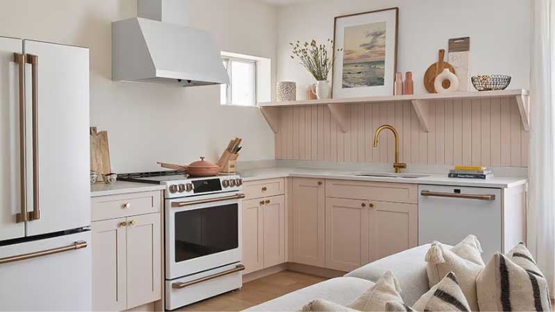 Designer kitchen with range hood mounted too high